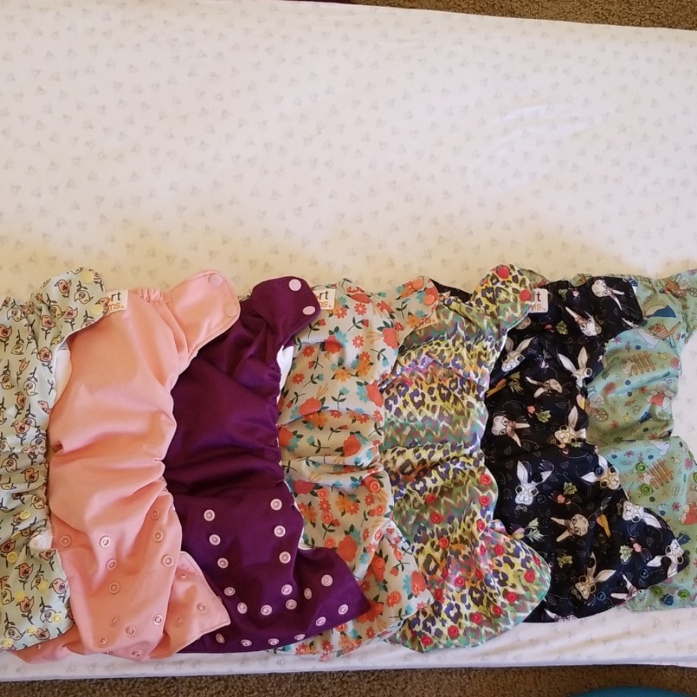 Smartbottoms cloth diapers, four left.